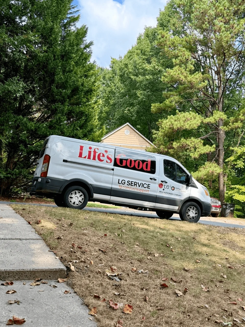 TAS service van displaying LG-authorized service branding